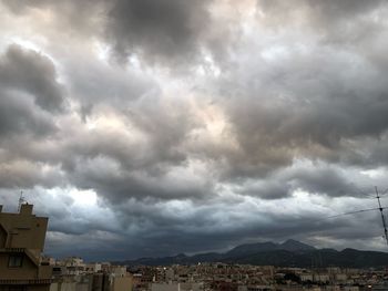 Storm clouds over city