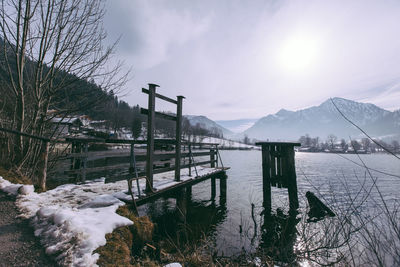 Scenic view of mountains against cloudy sky