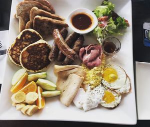 High angle view of breakfast served on table