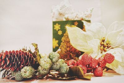 Close-up of christmas decorations on table