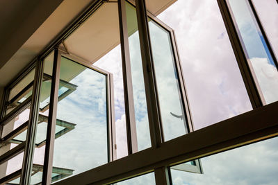 Low angle view of sky seen through window