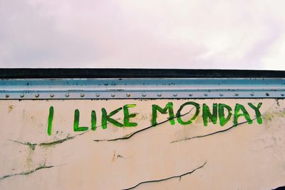 Close-up of text on wall