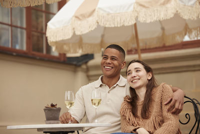 Couple celebrating on patio