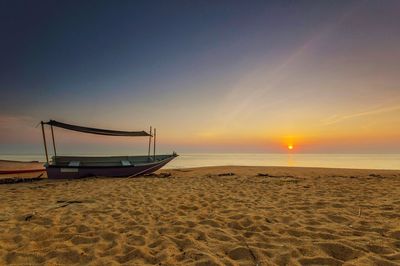 Scenic view of beach during sunset