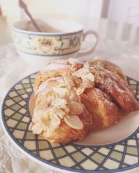 Close-up of croissant served in plate