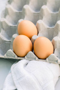 Full frame shot of eggs in carton