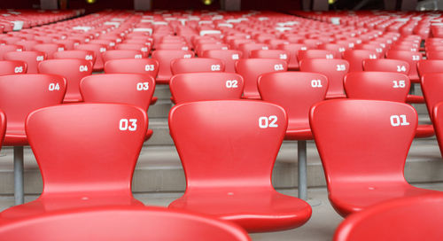 Empty red seats in stadium