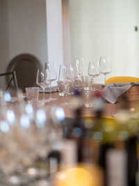 Close-up of wineglasses on table