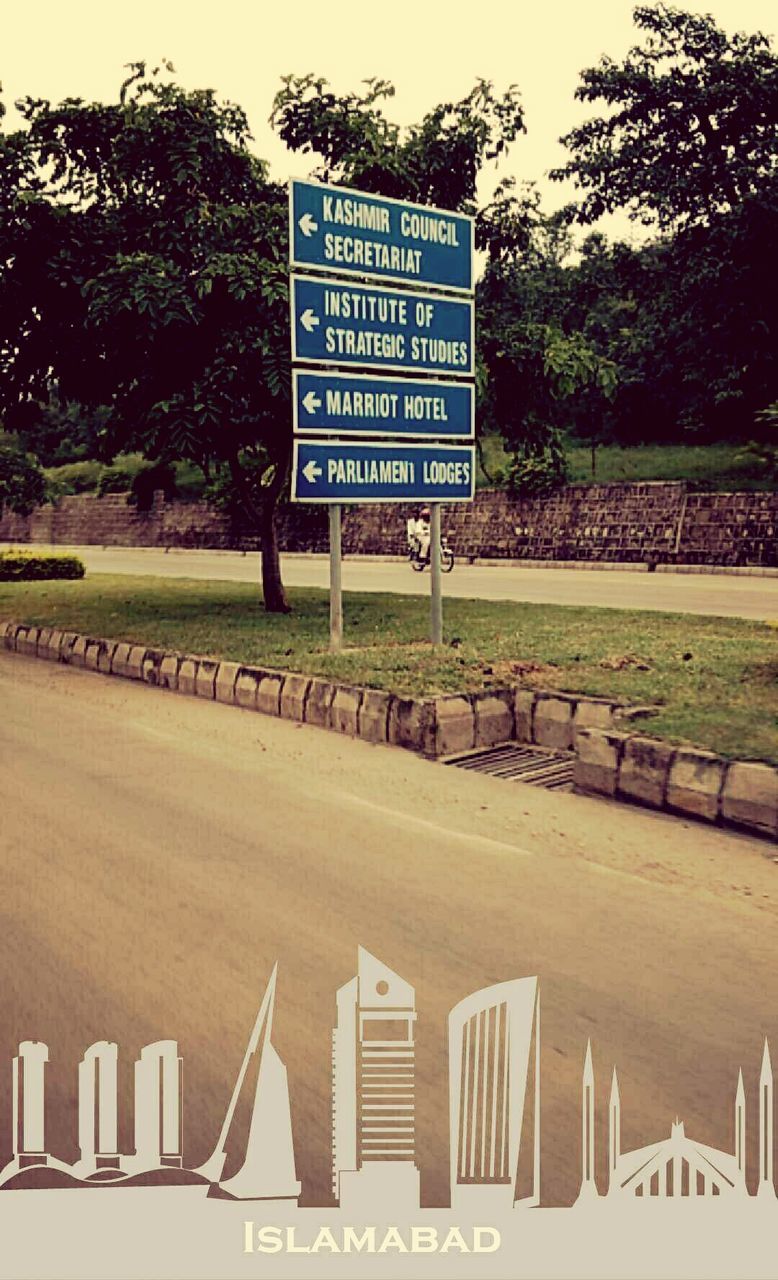 communication, text, information sign, no people, day, outdoors, city, road sign, tree, sky