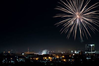 Firework display at night