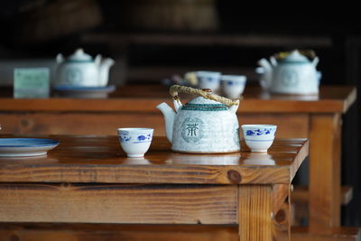Close-up of tea cup on table at home