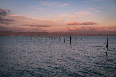 Scenic view of sea against sky at sunset