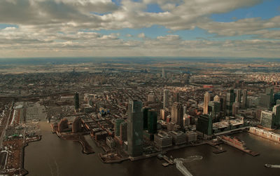 High angle view of river amidst buildings in city