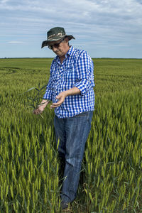 Full length of man standing on land