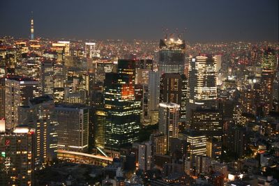 Illuminated cityscape at night