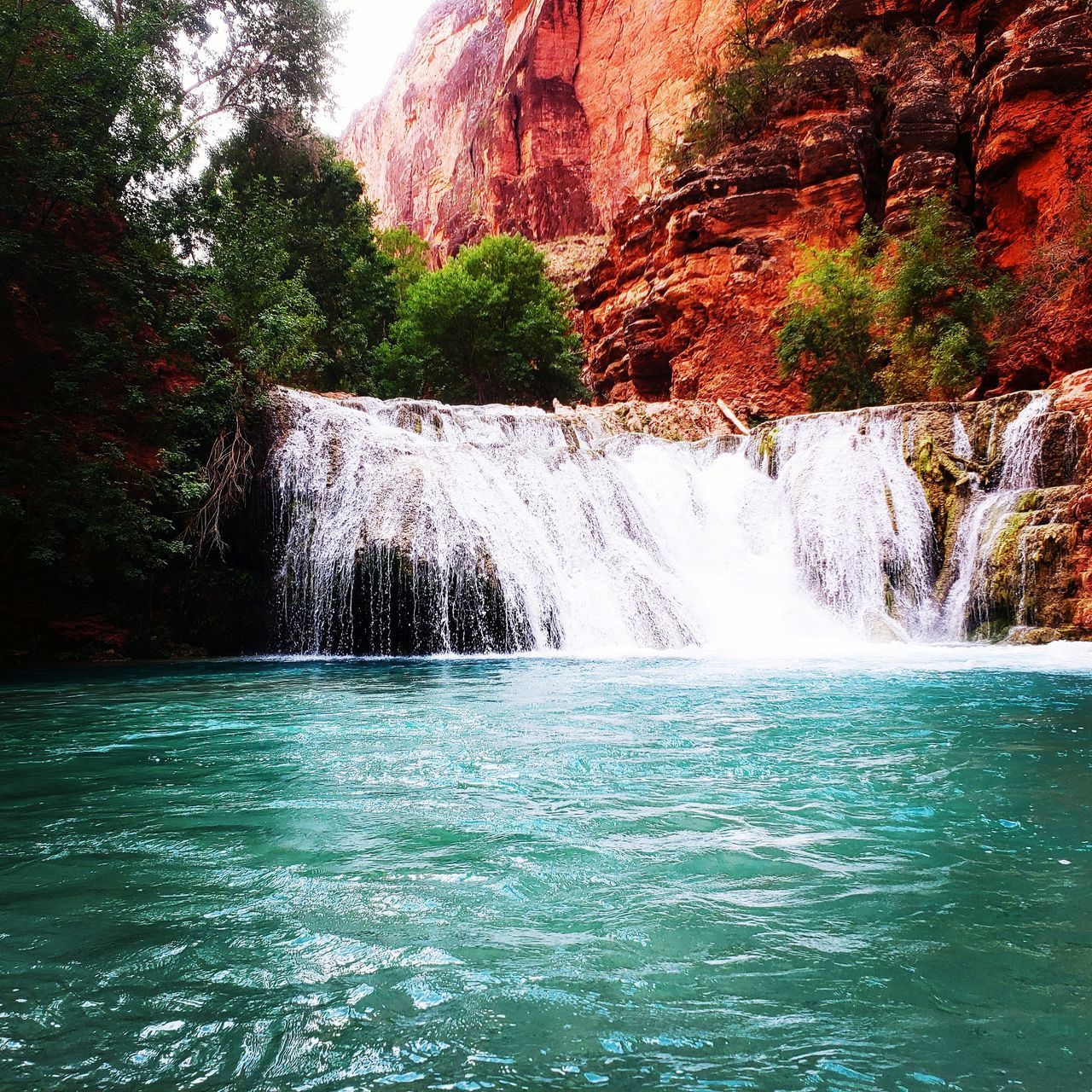 WATER FLOWING THROUGH ROCKS