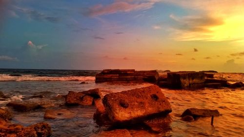 Scenic view of sea at sunset