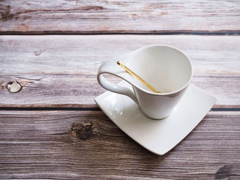 High angle view of coffee cup on table