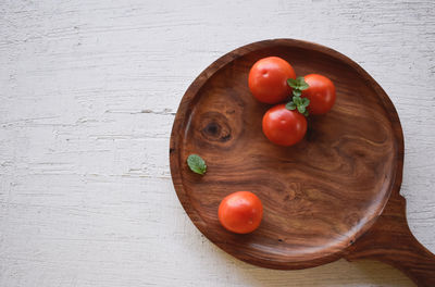 High angle view of tomatoes in bowl on table