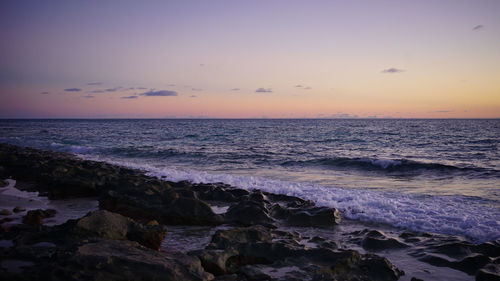 Sunset over the beach sea in miyakojima, okinawa, japan a spectacular view of the beach