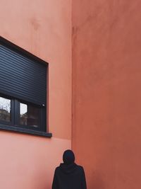 Man standing in front of building