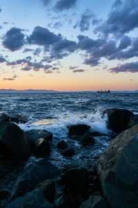 Scenic view of sea against sky during sunset