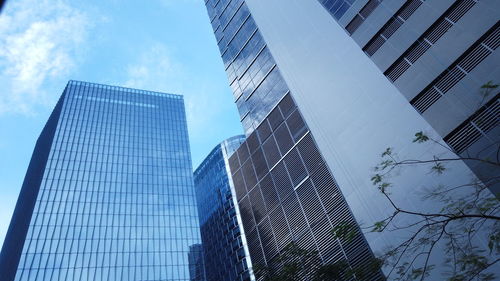 Low angle view of modern buildings against sky