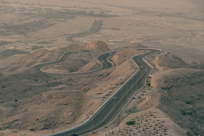 High angle view of road passing through a desert