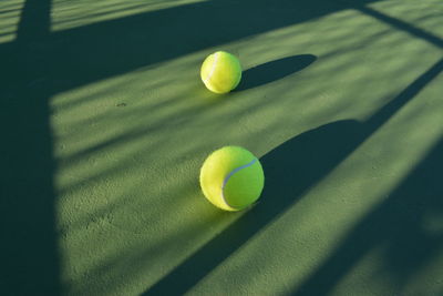 High angle view of tennis ball on sports court