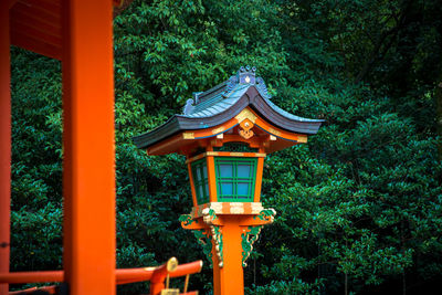 Close-up of built structure against trees