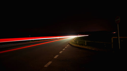 Light trails on road at night