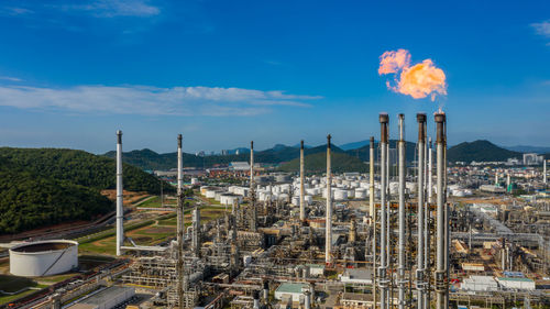 Aerial view oil and gas refinery petrochemical plant industrial with oil and gas storage tank.