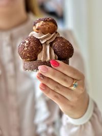 Close-up of woman holding ice cream