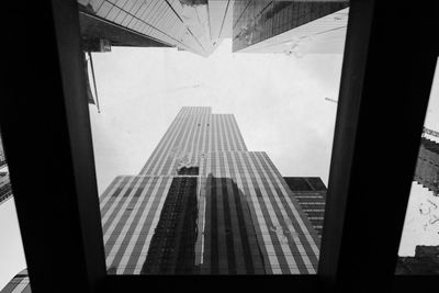 Low angle view of modern buildings against sky