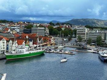 Boats moored at harbor