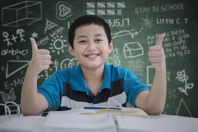 Boy studying at table