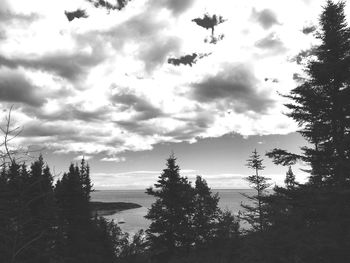Scenic view of sea against cloudy sky