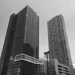 Low angle view of modern buildings against clear sky