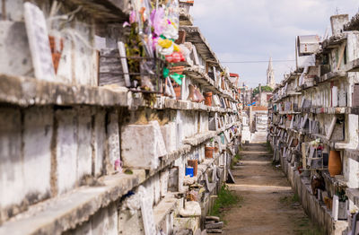 Narrow alley amidst buildings in city