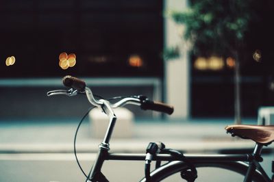 Bicycle parked against blurred background