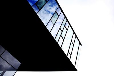 Low angle view of skyscraper against clear sky