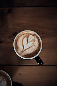 Directly above shot of coffee cup on table