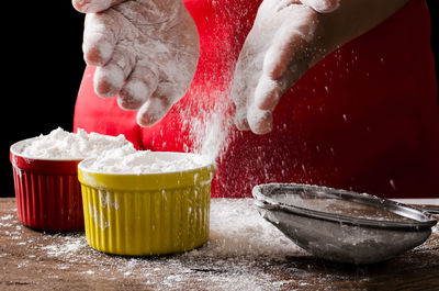 Close-up of person preparing food