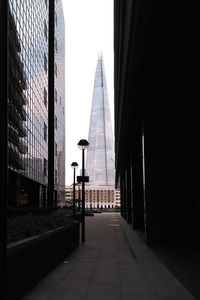 Modern buildings against sky in city