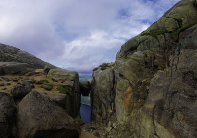 Panoramic view of rocky mountains against sky