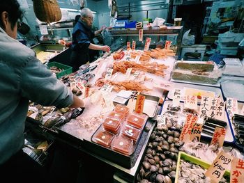 Man working at market stall