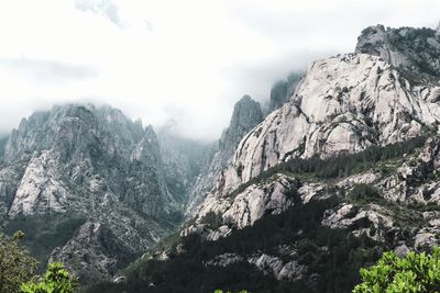 Panoramic view of mountain range against sky