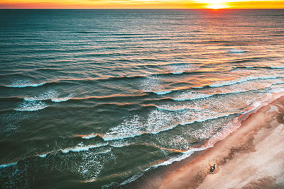 Scenic view of sea during sunset