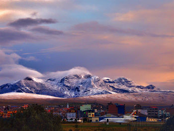 Scenic view of snowcapped mountains against sky during winter