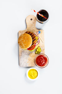 Close-up of burger on serving board